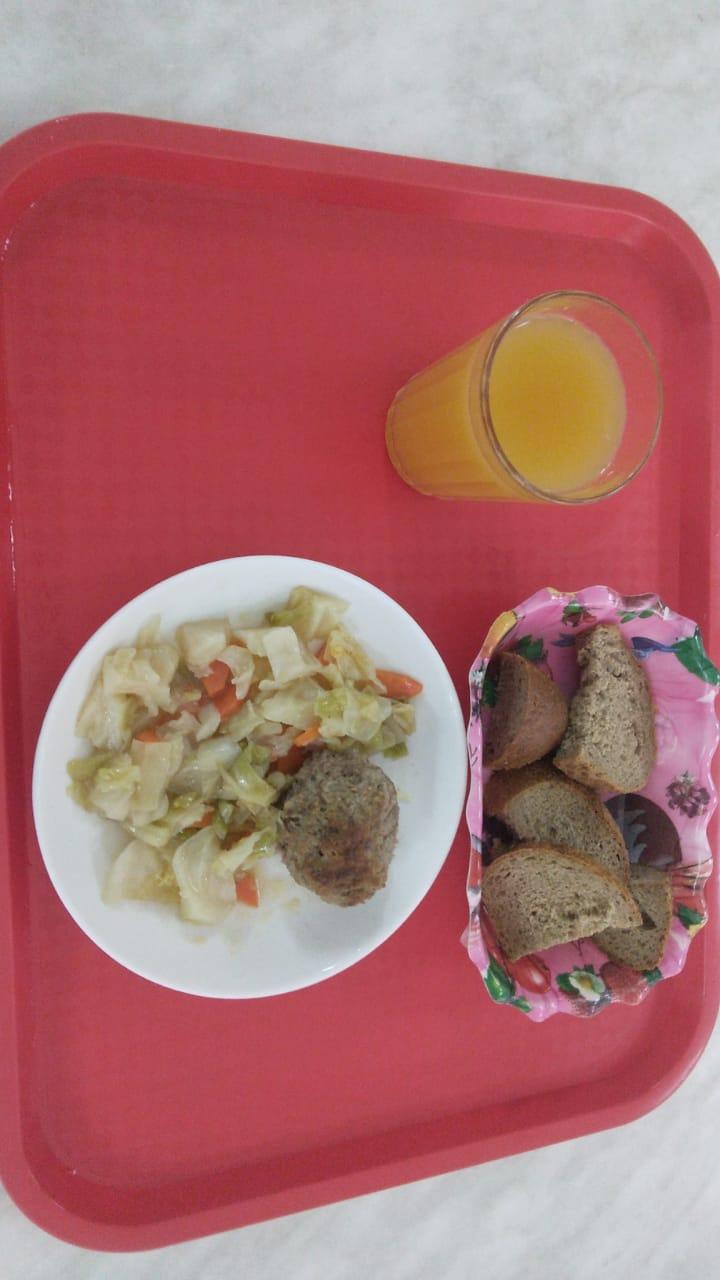 Тегін тамақтануды ұйымдастырудан көрініс.